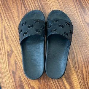 Authentic Gucci Black Women’s rubber GG slide sandal